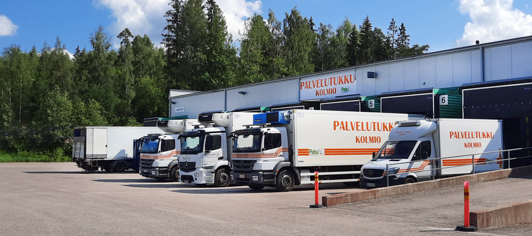 Palvelutukku Kolmion lastauslaituri ja ajoneuvot